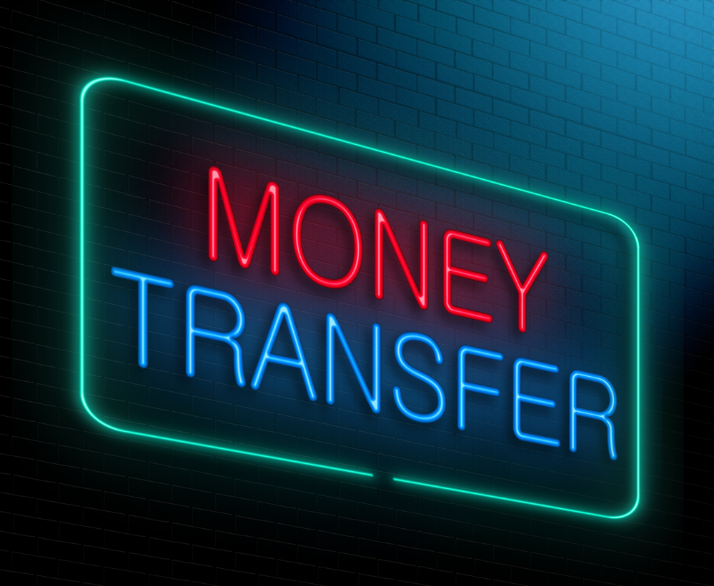 Money transfer sign in neon lights